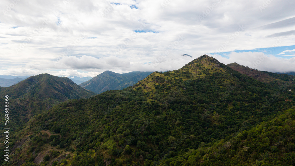 Tropical mountain range and mountain slopes with rainforest. Sri Lanka.
