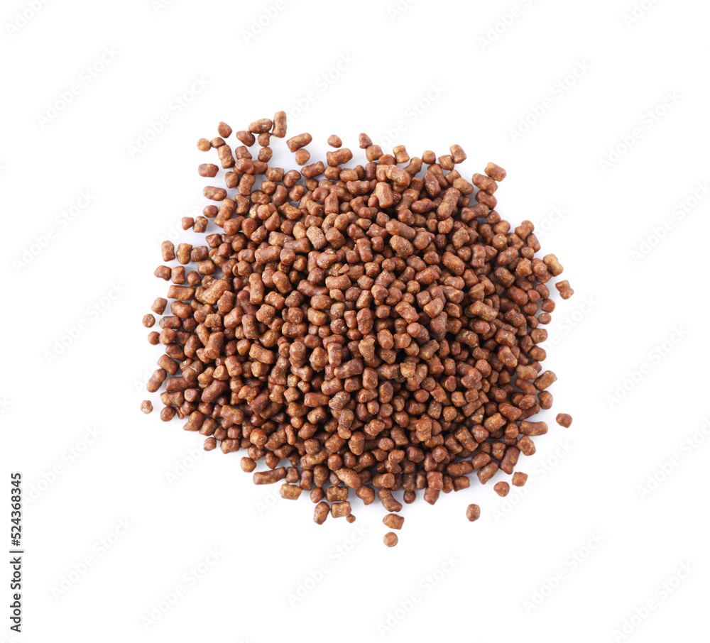 Pile of buckwheat tea granules on white background, top view Pile of buckwheat tea granules on white background, top view