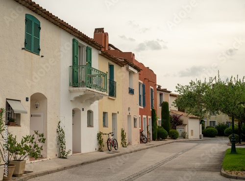 Colorful houses in Port Grimaud  village on Mediterranean sea with yacht harbour  Provence  France