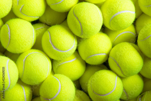 Close up of tennis balls, yellow terry cloth texture, racket sports © uaurora