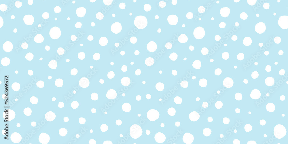 Seamless playful hand drawn light blue and white polka dot, snow or animal spots fabric pattern. Abstract geometric circle background texture. Boy's birthday, baby shower or nursery wallpaper design.