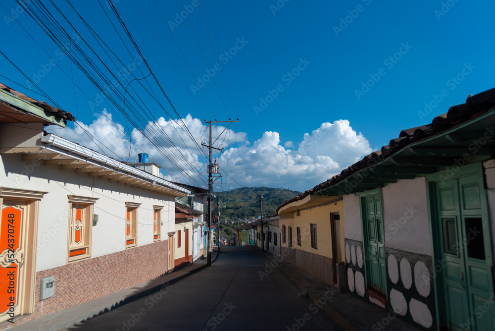 Street of a rural town on a sunny day in Colombia.