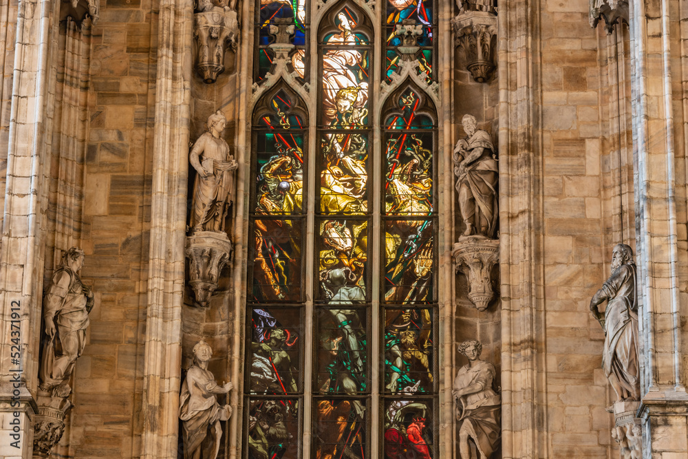 detail of the cathedral stained glass window in church