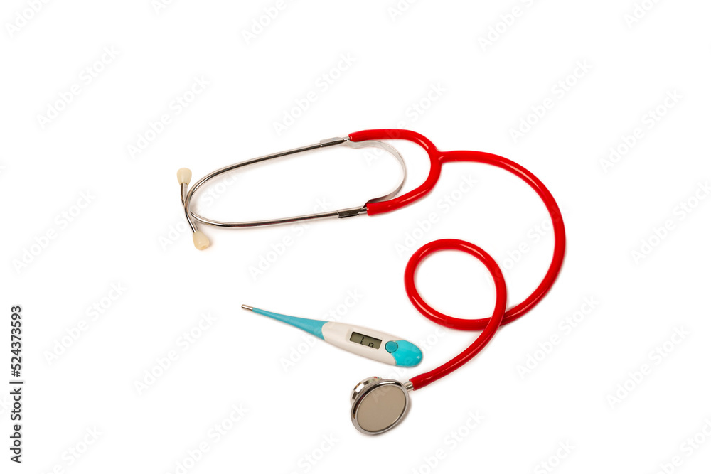 Red stethoscope, thermometer isolated on white background. Flat lay with different medical doctor objects, equipment supplies on white isolation. Close up, copy space. Medical and cardiology concept