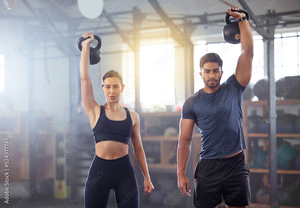 Fotografia do Stock: Fitness couple doing a kettlebell workout, exercise or  training in a gym. Fit sports people, woman or man with a strong grip,  exercising using gyming equipment to build muscles