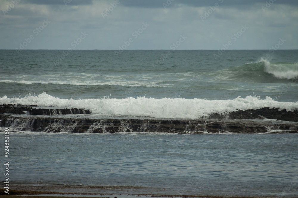 Waves breaking over the barrier reef at Sibauma beach in Rio Grande do Norte. Waves breaking over the barrier reef at Sibauma beach in Rio Grande do Norte.