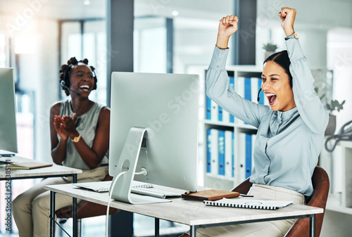 Excited, celebrating and working customer service agent happy about job success and promotion. Call centre web help, support and helpdesk worker with headset celebrate a career win or big bonus
