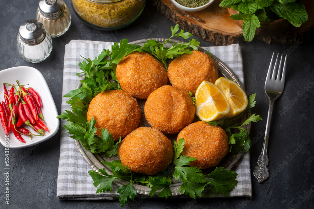 Kibbeh is a popular dish in Middle Eastern cuisine (Turkish name; icli kofte - Adana icli koftesi) Kibbeh is a popular dish in Middle Eastern cuisine (Turkish name; icli kofte - Adana icli koftesi)