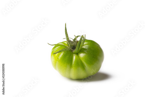 Green organic tomatoes on t...