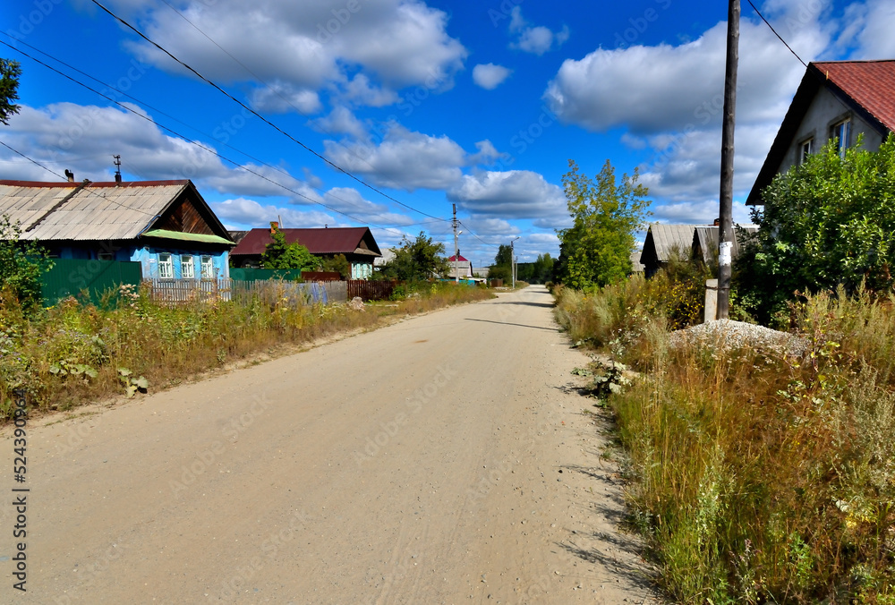 A deserted rural street on a summer day