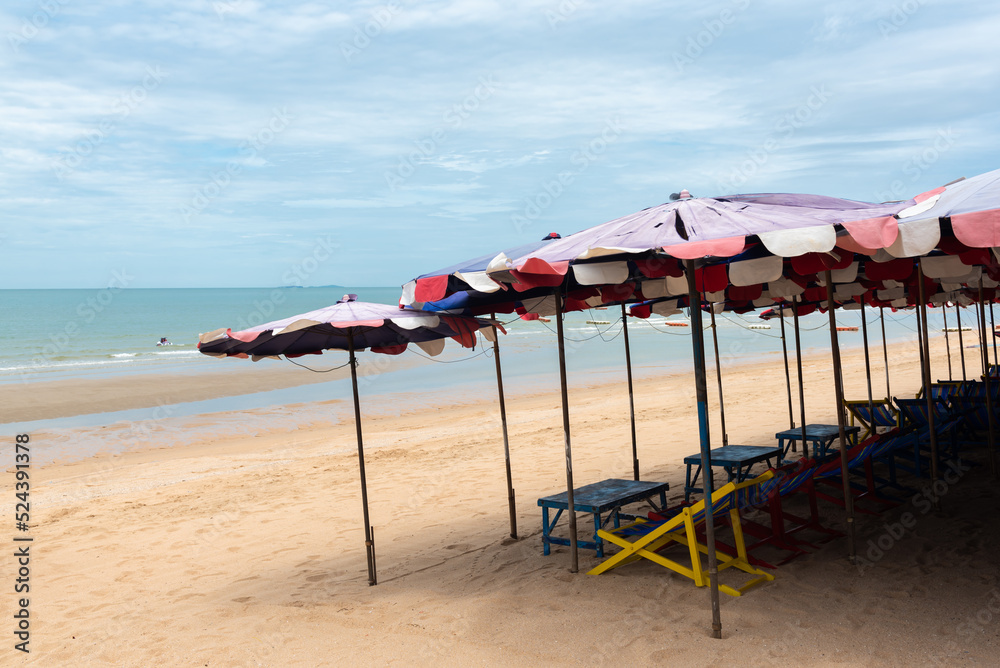 Sand beach with chair and  umbrella at Pattaya Beach, Thailand.