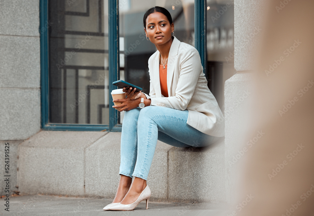 Phone, waiting and coffee break with a young startup entrepreneur or creative designer sitting outside in the city. Business woman looking away, thinking about the future and enjoying a drink