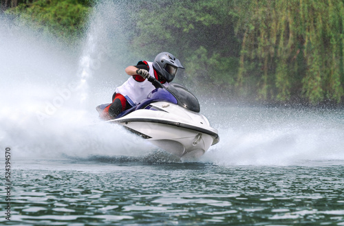 jet ski at high speed turn with splashes. extreme water sport.
