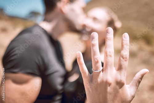 Photos Engagement, proposal and romance while showing off her diamond ring and saying yes to marriage outside