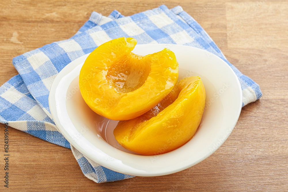 Sweet canned peaches with syrope Sweet canned peaches with syrope