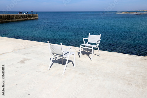 Chair for relaxing in a cafe on the Mediterranean coast © shimon