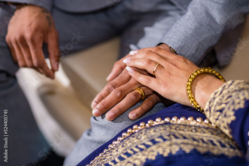 Indian couple's holding hands close up