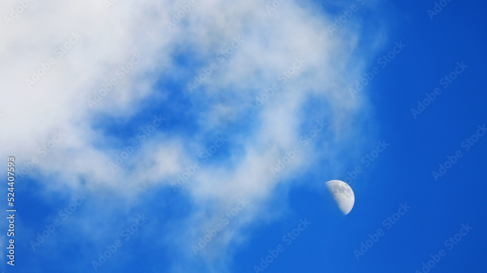 Half moon in blue sky Half moon in blue sky