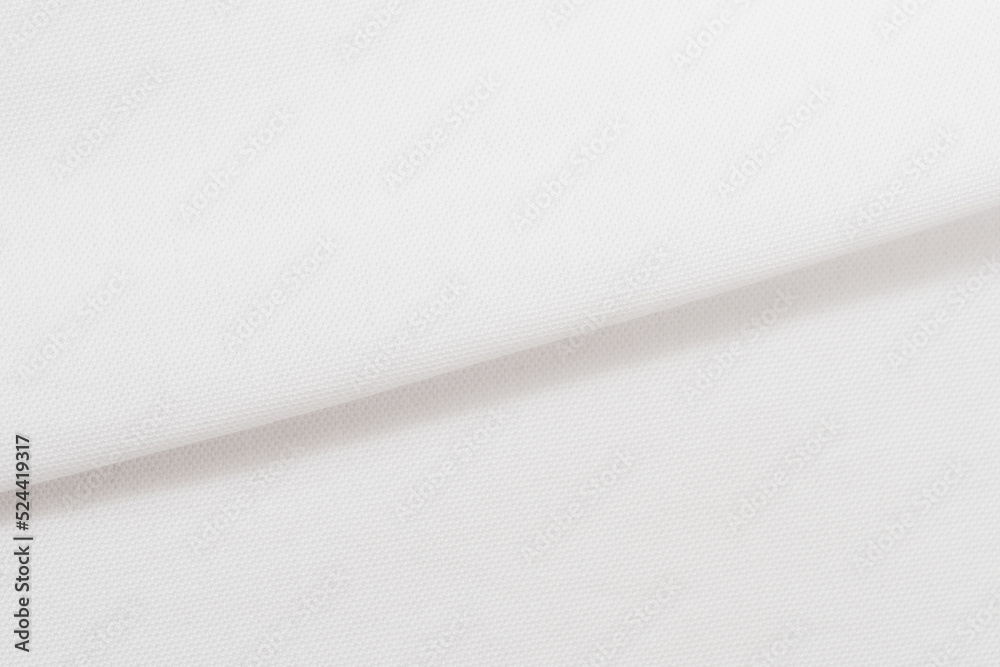 Macro Photo of white fabric texture background. Pattern of white woven clothing material. Macro Photo of white fabric texture background. Pattern of white woven clothing material.