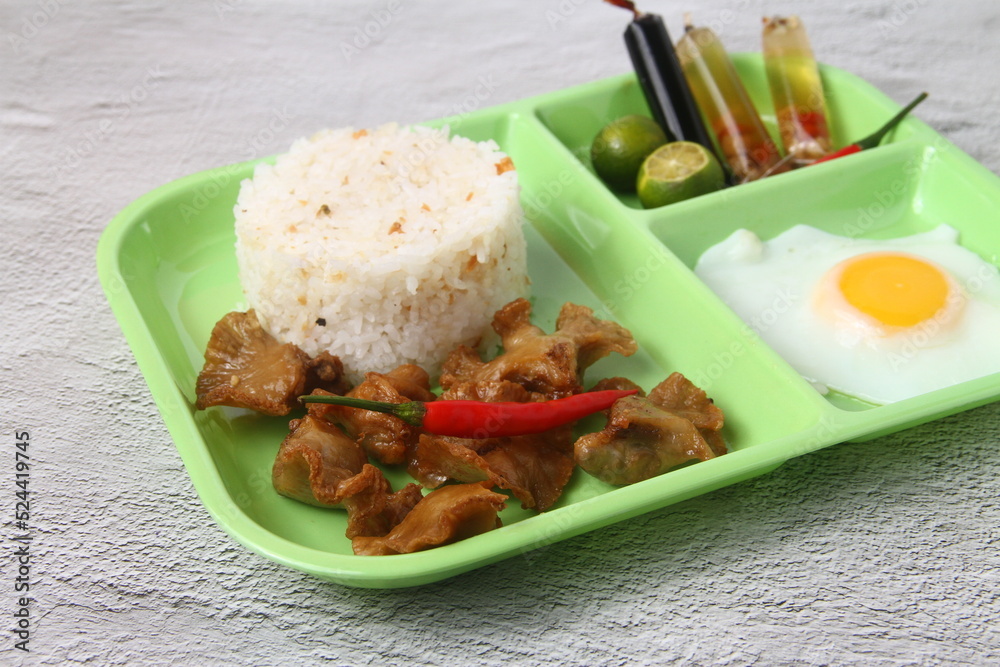 Freshly cooked Filipino food called chicharong bulaklak silog Stock ...