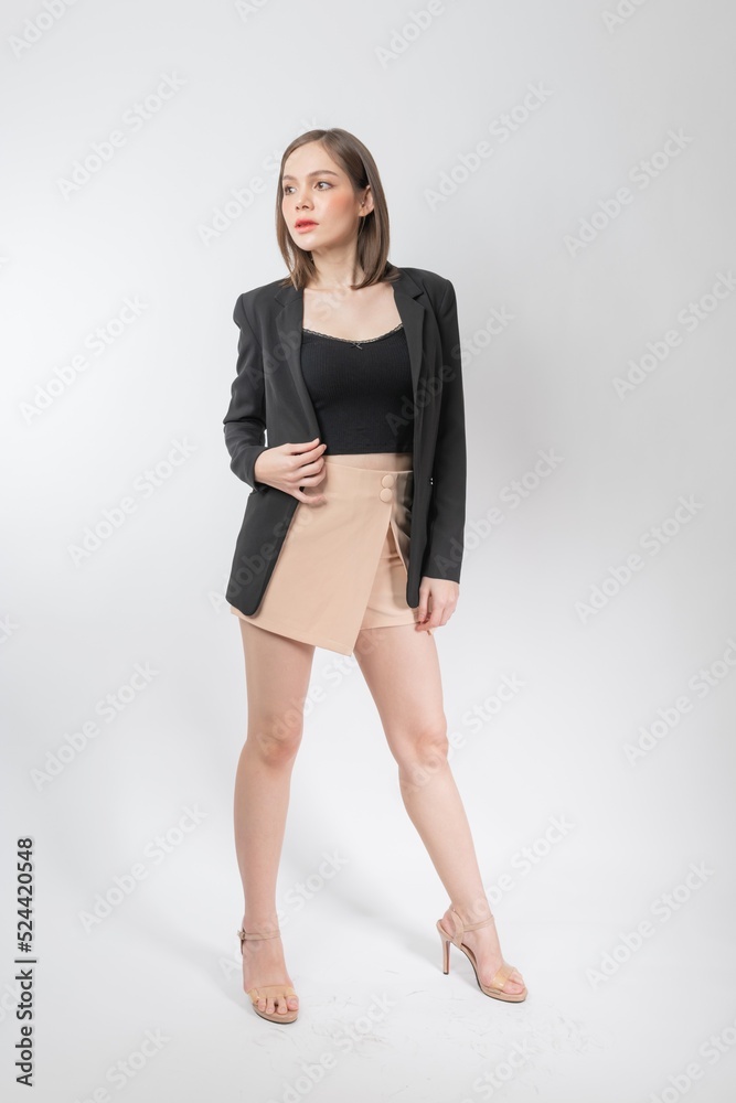 Full length body portrait of a young beautiful asian female businesswoman wearing stylish business attire and pose with different gestures & emotions. Suitable for business presentation or slides. Full length body portrait of a young beautiful asian female businesswoman wearing stylish business attire and pose with different gestures & emotions. Suitable for business presentation or slides.
