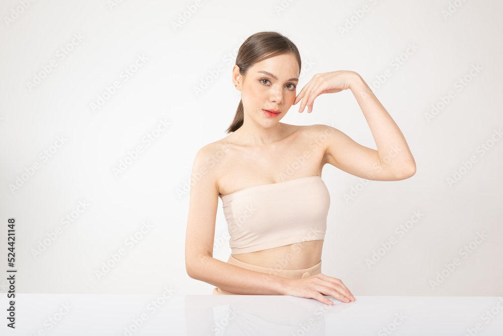 Portrait of a beautiful young asian female woman lady with clean, fresh and healthy smooth fair skin. Suitable for cosmetic, spa or massage advertisement, online social media and promotion sale usage. Portrait of a beautiful young asian female woman lady with clean, fresh and healthy smooth fair skin. Suitable for cosmetic, spa or massage advertisement, online social media and promotion sale usage.