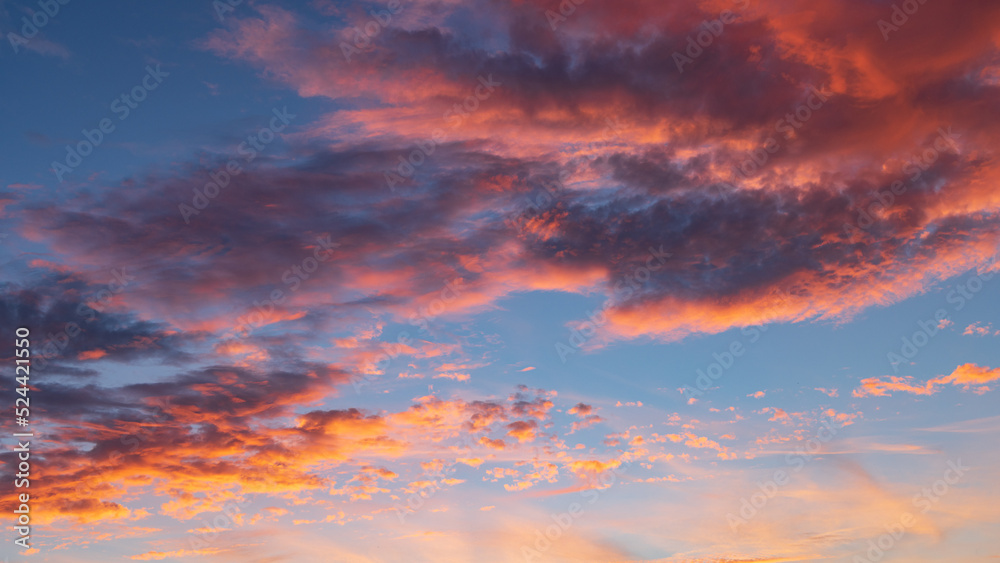 Colorful clouds and sky during sunset with red and blue