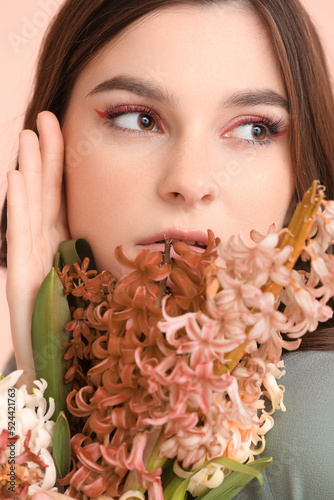 Beautiful young woman with ...