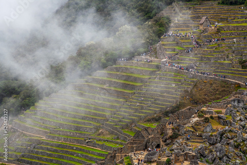 Machu Picchu ancient city view from Huchu'y Picchu in cloudy weather photo