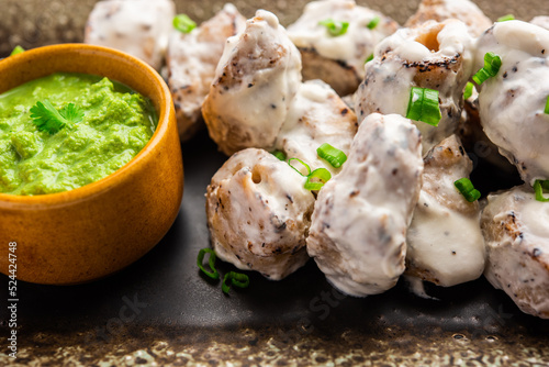 vegetarian soya malai chap made using soya chaap with white creamy gravy