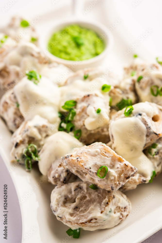vegetarian soya malai chap made using soya chaap with white creamy gravy vegetarian soya malai chap made using soya chaap with white creamy gravy