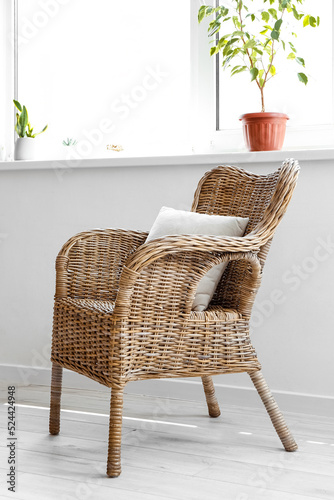 Rattan armchair with cushio...