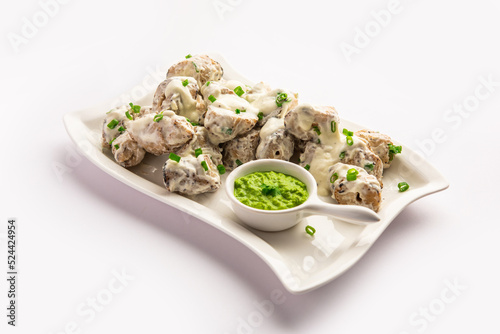 vegetarian soya malai chap made using soya chaap with white creamy gravy