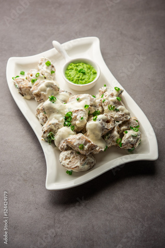 vegetarian soya malai chap made using soya chaap with white creamy gravy