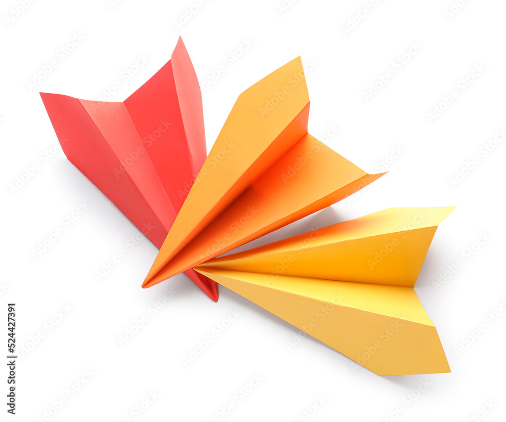 Colorful paper planes on white background Colorful paper planes on white background