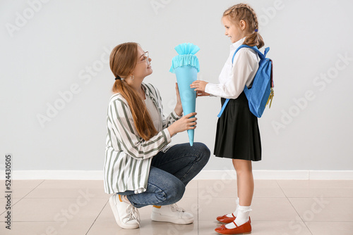 Mother greeting her little ...