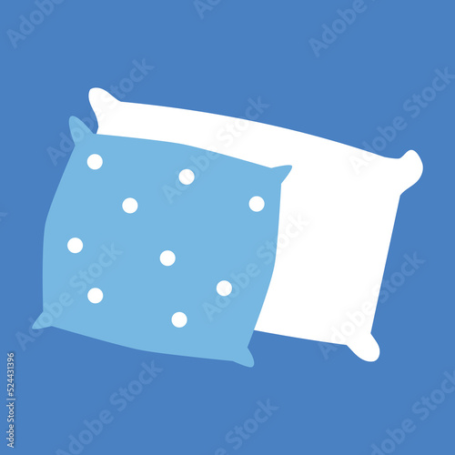 Blue polka dot pillow and white pillow