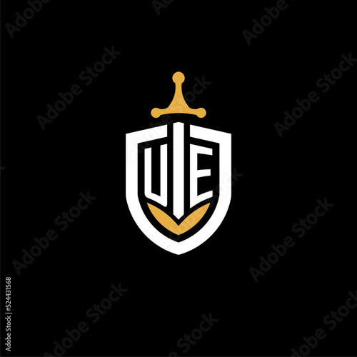 Creative letter UE logo gaming esport with shield and sword design ideas