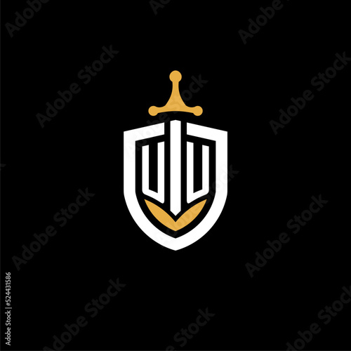 Creative letter UU logo gaming esport with shield and sword design ideas photo