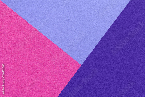 Texture of craft bright purple, navy blue and very peri shade color paper background, macro. Vintage abstract cardboard
