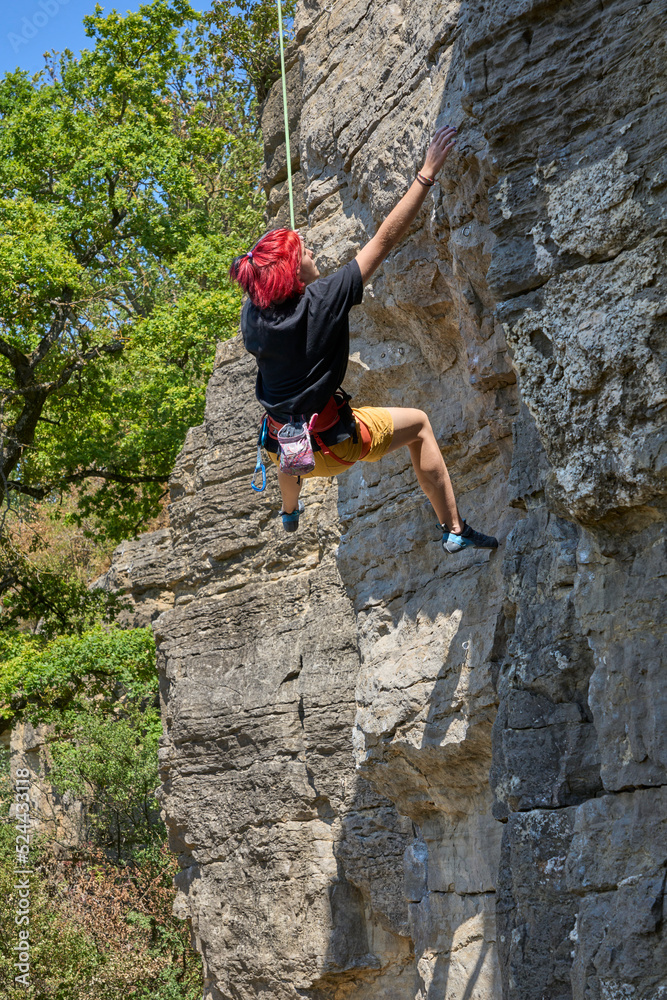 Teenage girl in a difficult rock climbing tour in the Rockgarden in Hessigheim, Neckar valley, Baden-Wuerttemberg, Germany
Teenage girl in a difficult rock climbing tour in the Rockgarden in Hessigheim, Neckar valley, Baden-Wuerttemberg, Germany