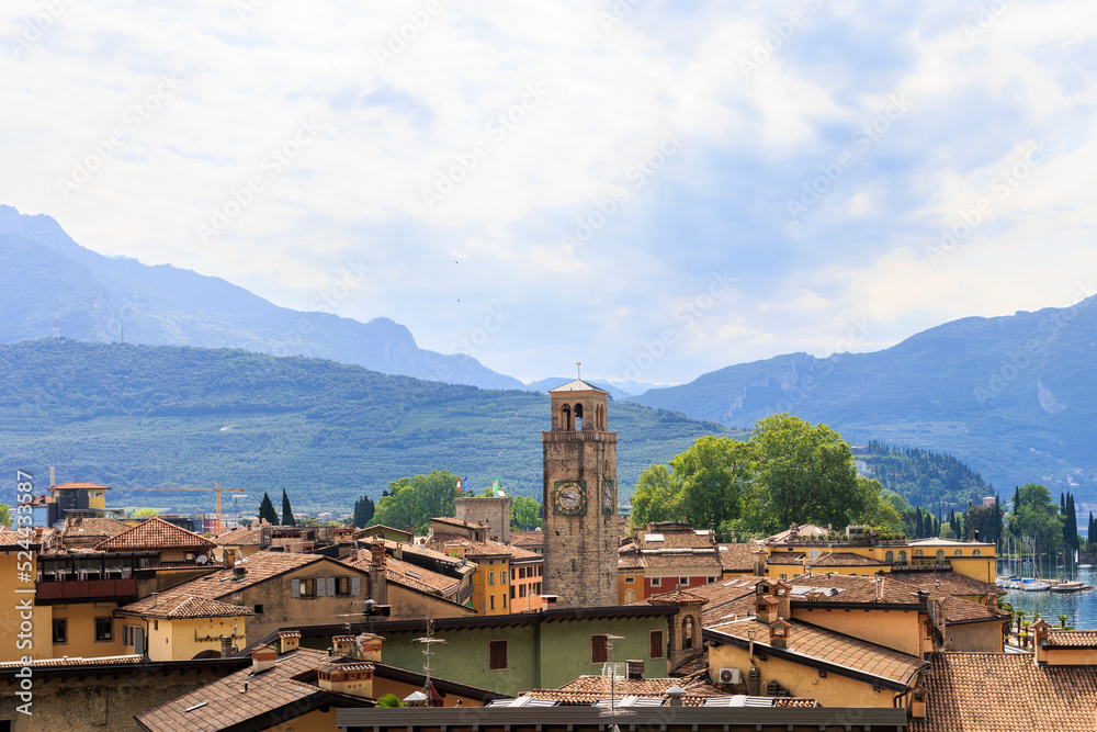 View over the roofs of the Italian town Riva del Garda on Lake Garda with cloudy sky