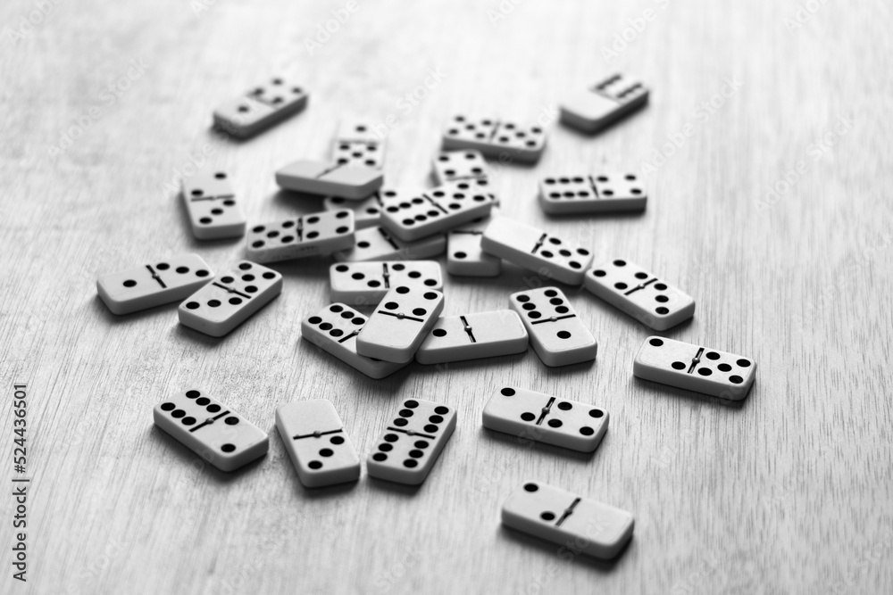 Dominoes on a table in black and white Dominoes on a table in black and white