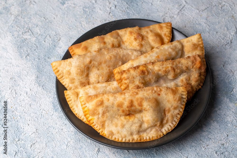 Traditional delicious Turkish foods,minced meat in savoury pastry (Turkish name; ci borek or cig borek) Traditional delicious Turkish foods,minced meat in savoury pastry (Turkish name; ci borek or cig borek)