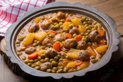 Turkish Food Green Pea Stew with Meatballs - Kofte or Kofta Bezelye. (Turkish name; kofteli bezelye) photo