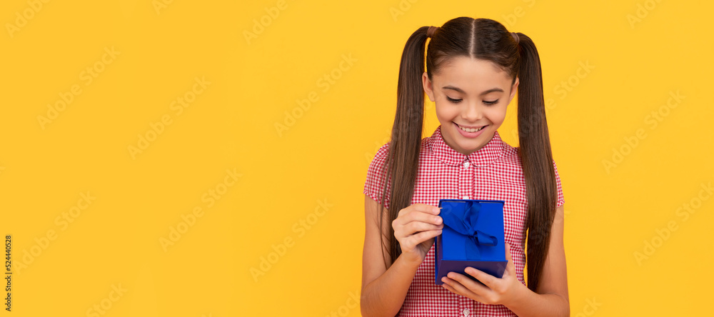 shopping sale and discount present for womens day. teen girl open giftbox. child prepare for holiday. Kid girl with gift, horizontal poster. Banner header with copy space. shopping sale and discount present for womens day. teen girl open giftbox. child prepare for holiday. Kid girl with gift, horizontal poster. Banner header with copy space.