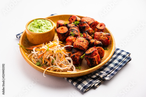 Tandoori Soya Chaap or soy chap dish prepared by marinating in tandoori spices, closeup view photo