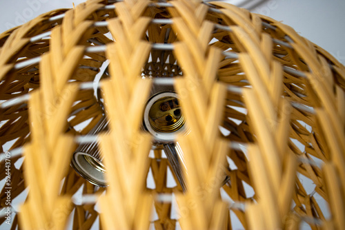 Chandelier and Lampholders. wooden wicker knitted chandelier photo