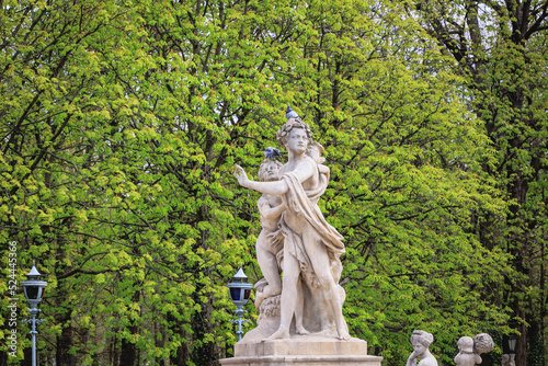 Statue of Hermaphroditus rejecting Salmacis in Lazienki - Royal Baths Park in Warsaw city, Poland