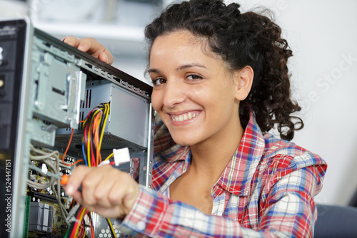 Wallpaper Mural a happy female pc technician Torontodigital.ca